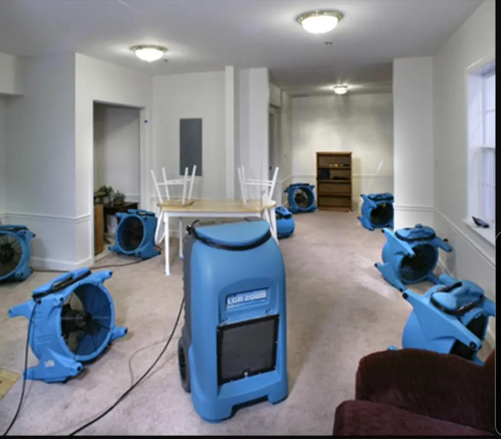 Air movers and dehumidifier setup for Water Damage Restoration in Carolina Shores